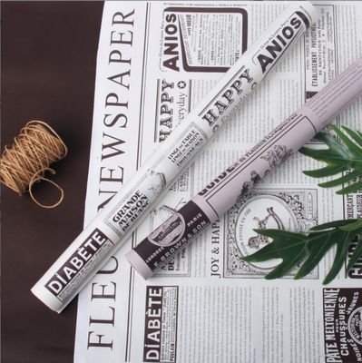 Giá tốt. Tờ báo tiếng Anh cũ, giấy kraft, giấy bọc hoa Valentine, vật liệu đóng gói hoa hồng, giấy bọc cuộn cho hoa trực tuyến