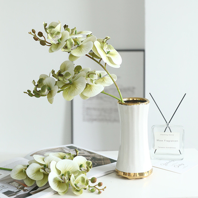 Giá tốt. A fresh and elegant 3D printed 7-head film Phalaenopsis artificial flower, light luxury home living room and dining table floral arrangement artificial flower trực tuyến