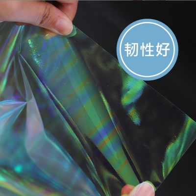 Sản phẩm bán buôn phim cầu vồng chống nước, giấy kính trong suốt, giấy hoa, giấy laser, giấy đóng gói hoa
